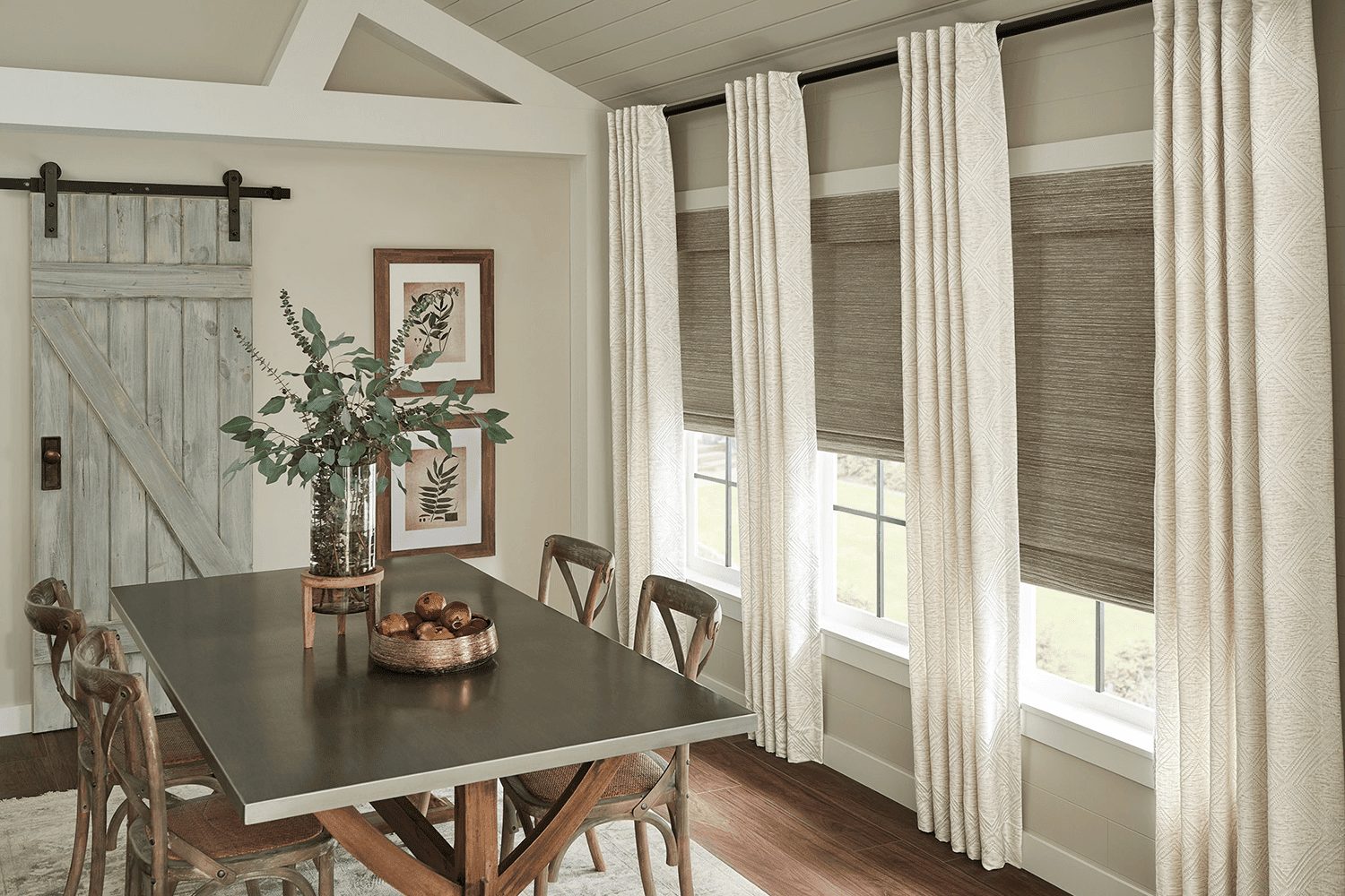 Dining room with Graber drapery and woven shades